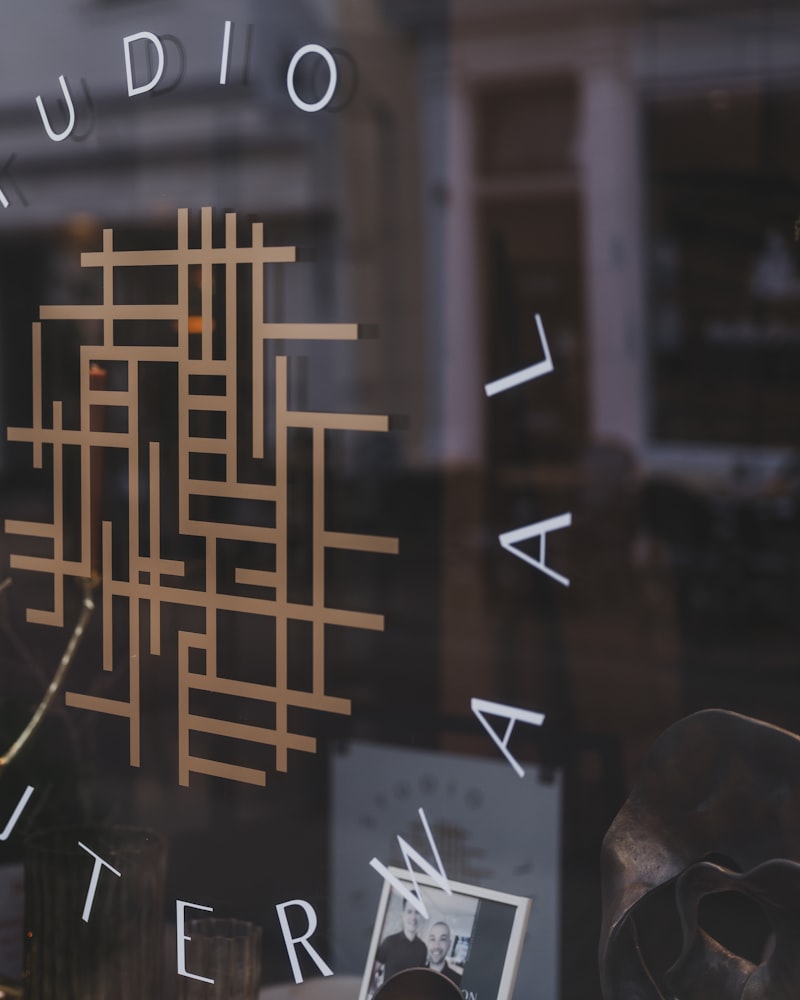 Brand identity and logo design concepts on a studio desk