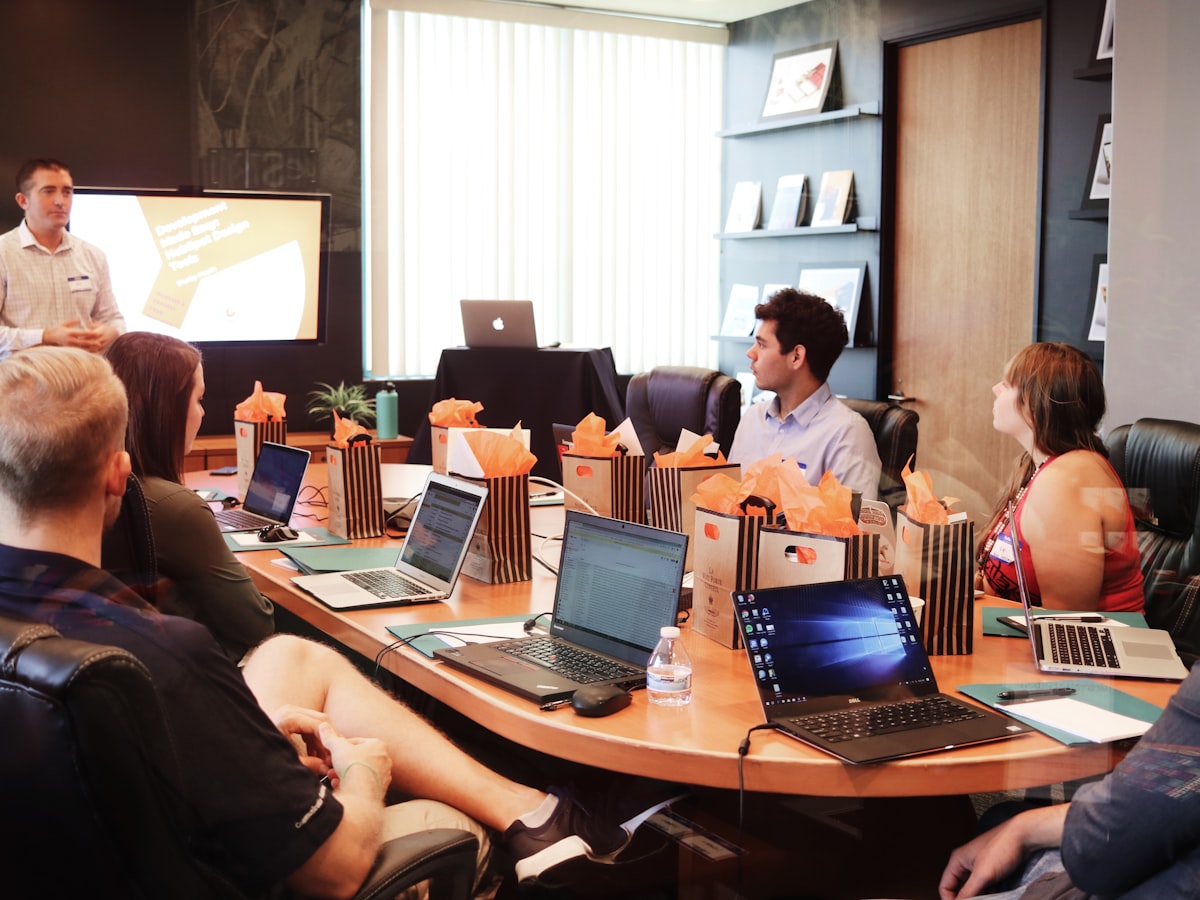 Unified growth team reviewing a multi-channel marketing dashboard